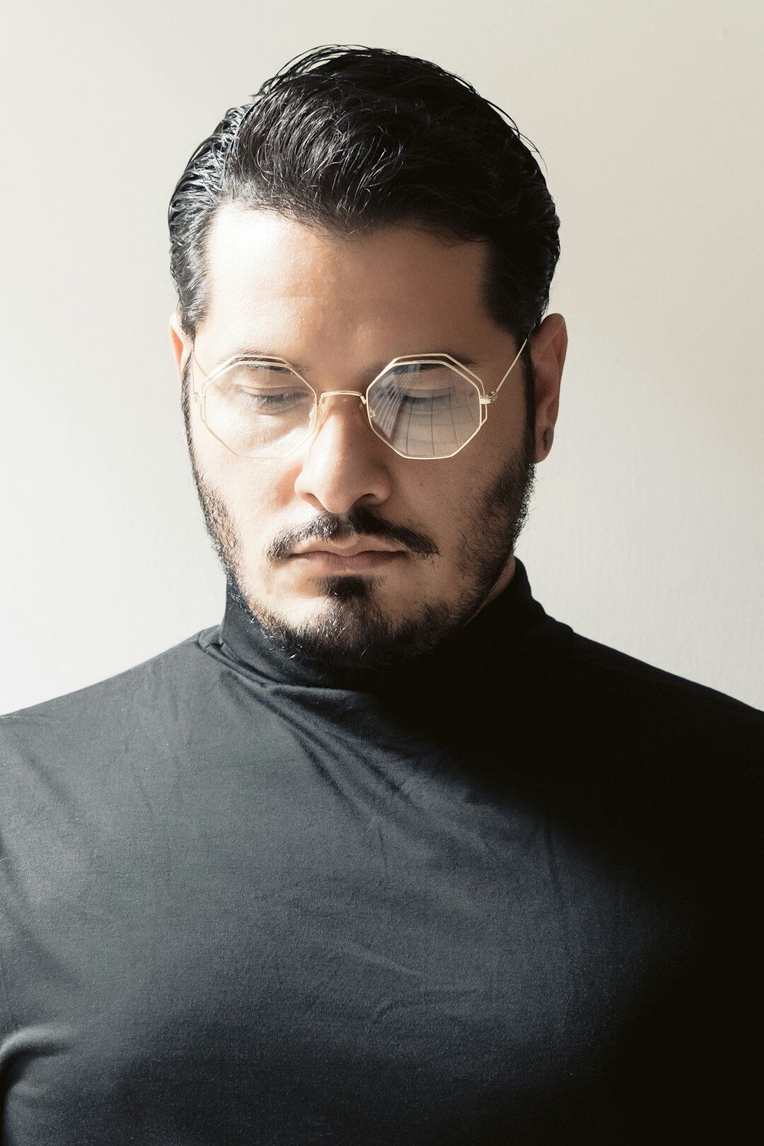 Studio portrait of a Turkish man legal consultant with glasses