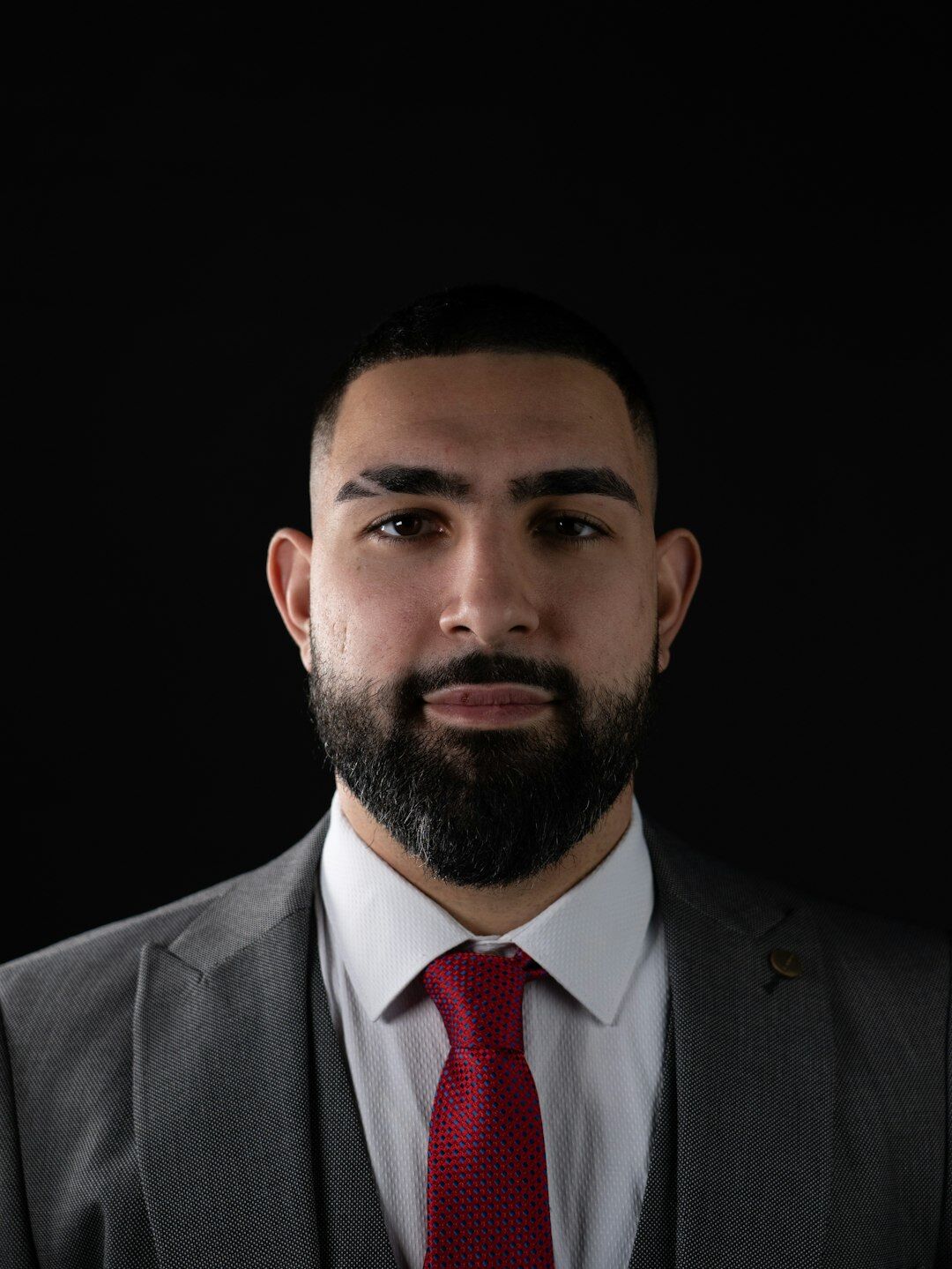 Studio portrait of a Turkish man client relations advisor